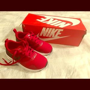 Youth size 11M Nike with box.  Never worn.